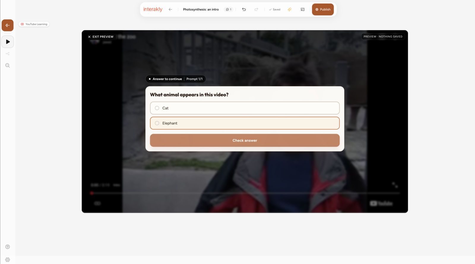 Interakly editor preview showing a YouTube video paused with a multiple-choice quiz overlay
