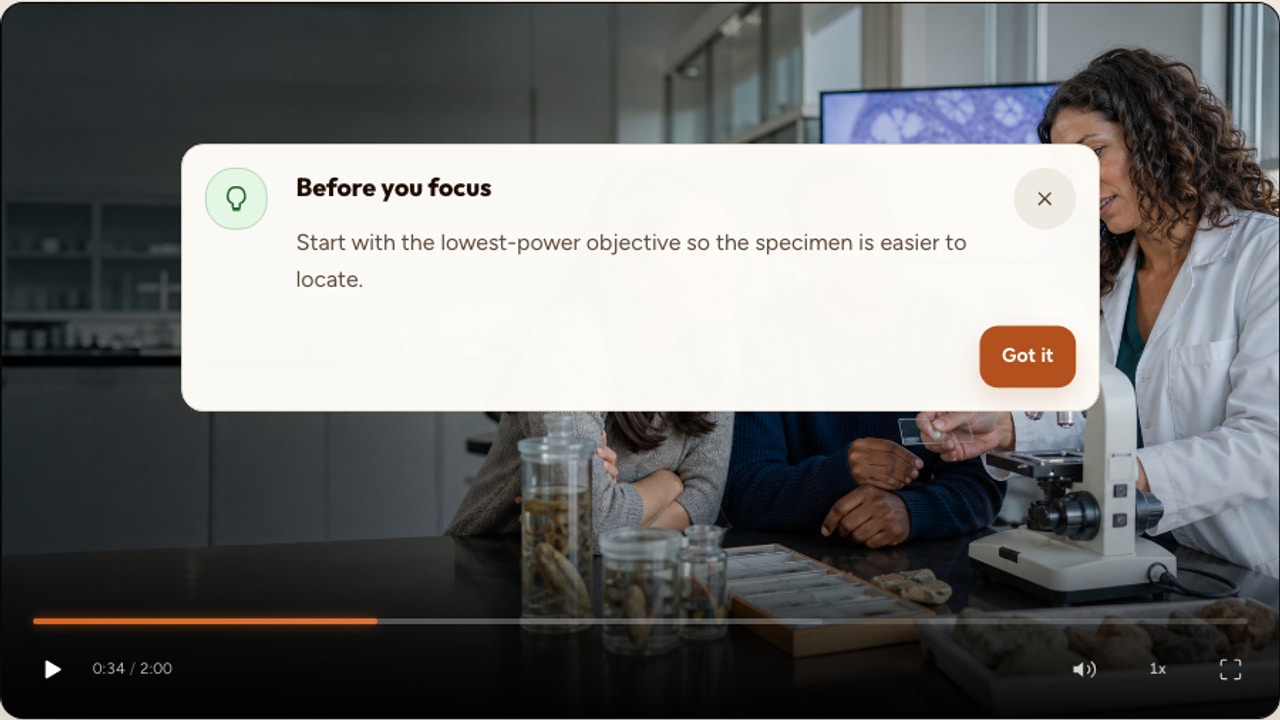 A real Interakly information card layered over a realistic instructional video frame
